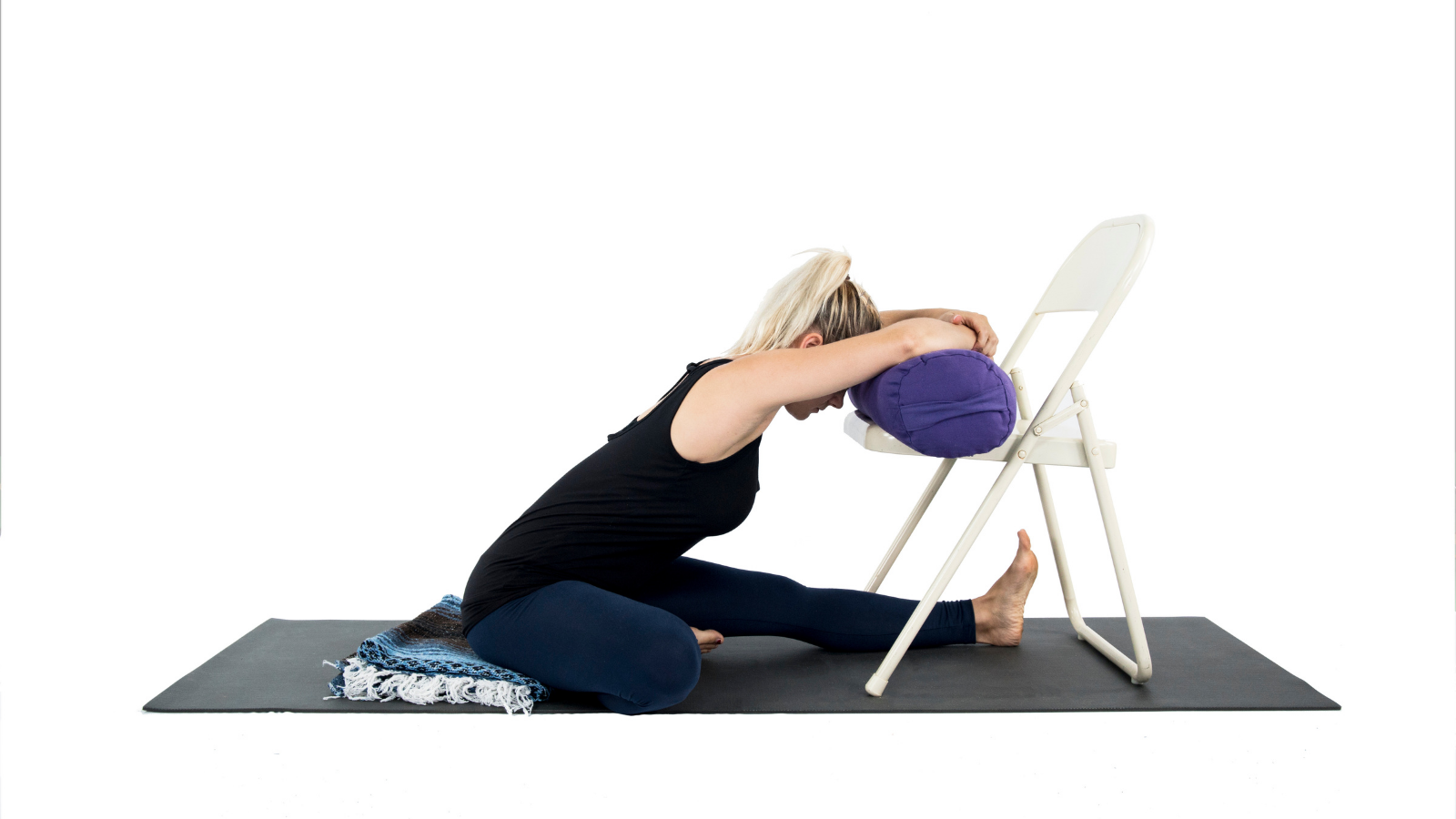 Head-to-Knee Pose or Janu Sirsasana using a chair as prop. Calming for Vata Dosha