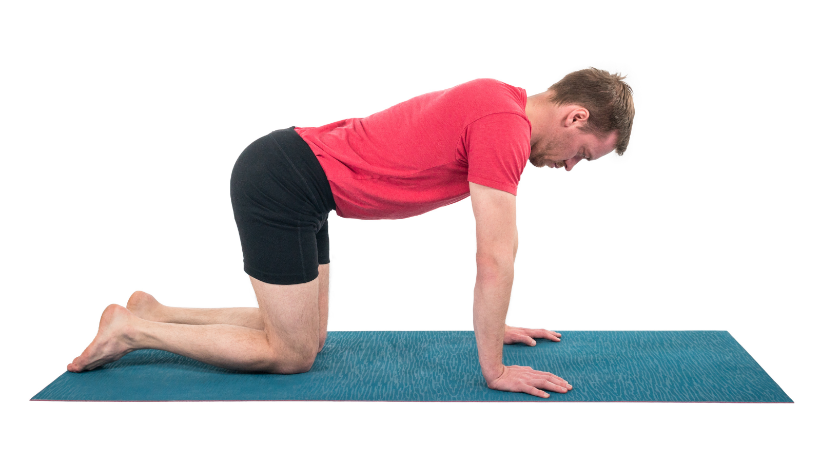 Man doing Bharmanasana (Tabletop Pose)