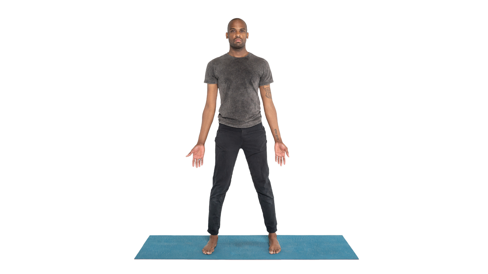 Tadasana or Mountain pose variation with wide legs