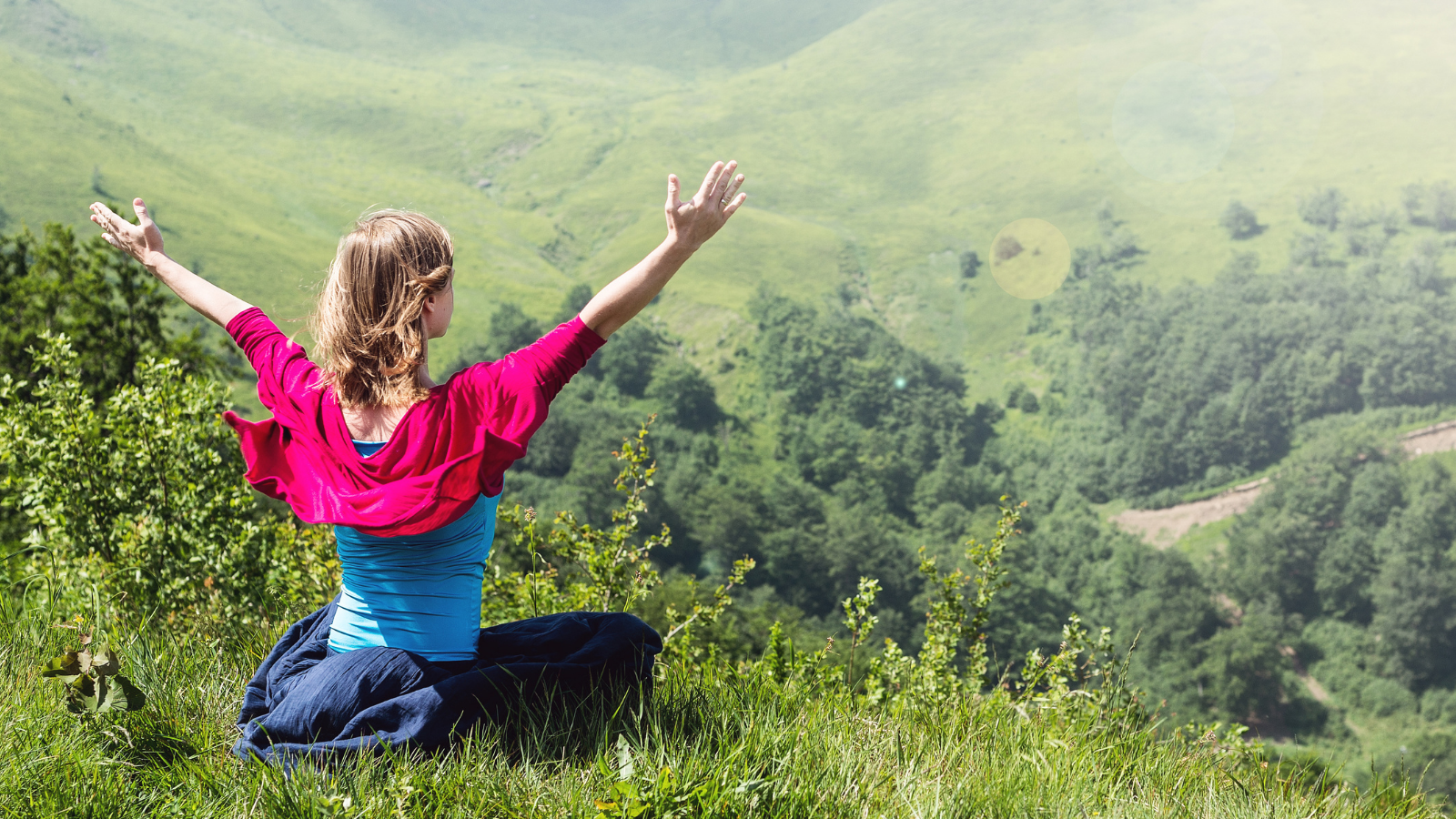 Blonde Woman practicing Yoga at the mountains- nature, exercise as mindful activities