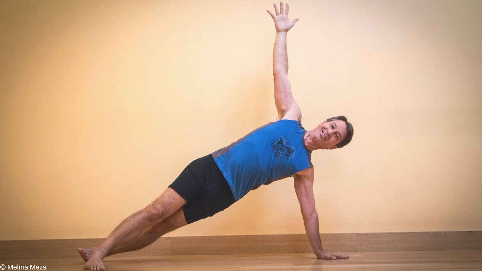 Vasisthasana or Side Plank Pose practiced with the feet separated