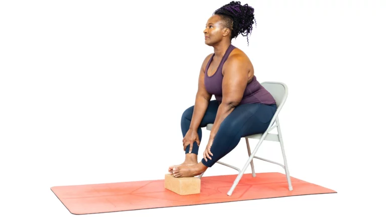 Woman doing yoga exercise called: Revolved Hand to Big Toe Pose, sanskrit  name: Hasta Padangusthasana, isolated on white background Stock Photo -  Alamy