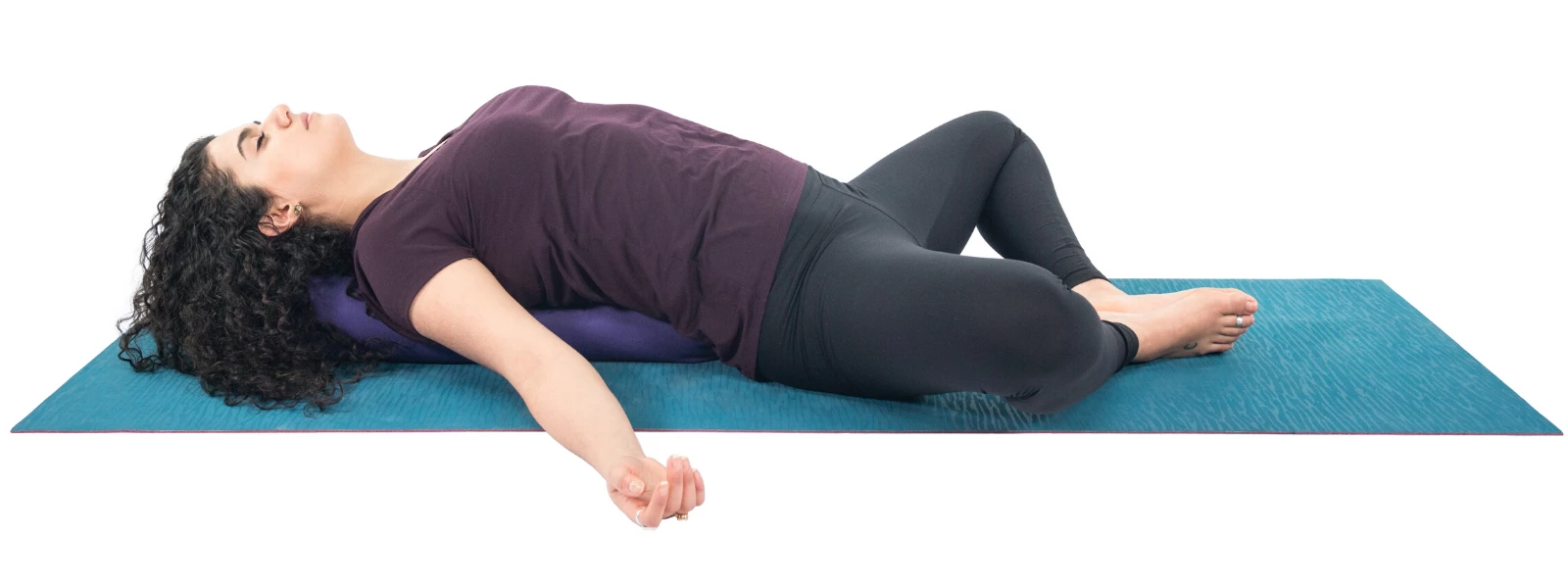 Reclining Bound Angle Pose (Supta Baddha Konasana) with bolster for back