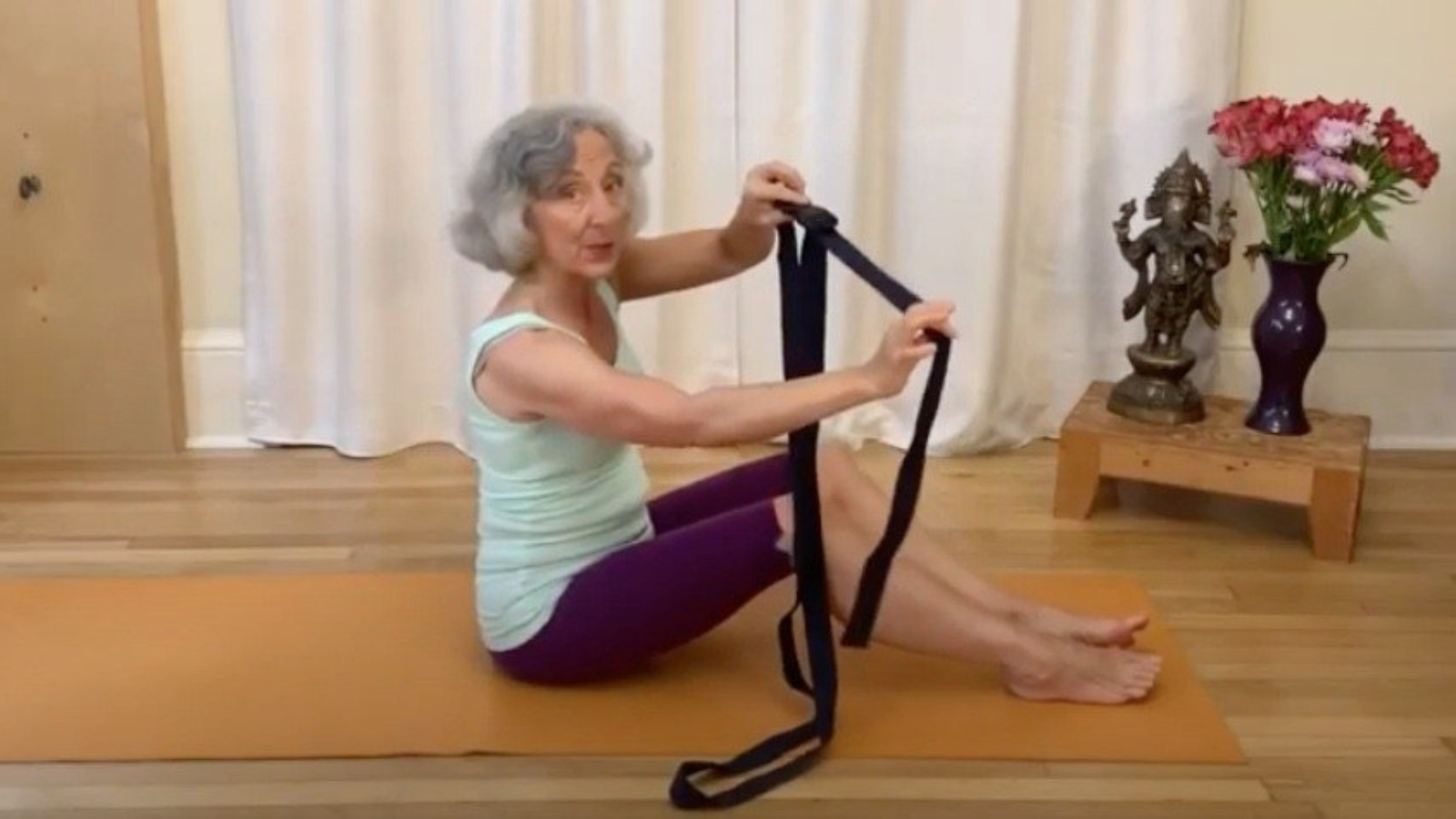 Ease Low Back Pain: A Simple Traction Technique with a Yoga Strap