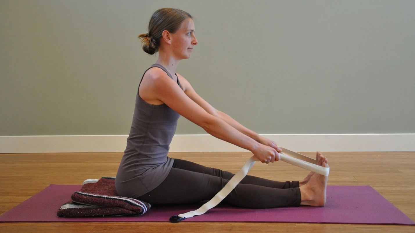 Adjusting Seated Forward Bend - Yoganatomy