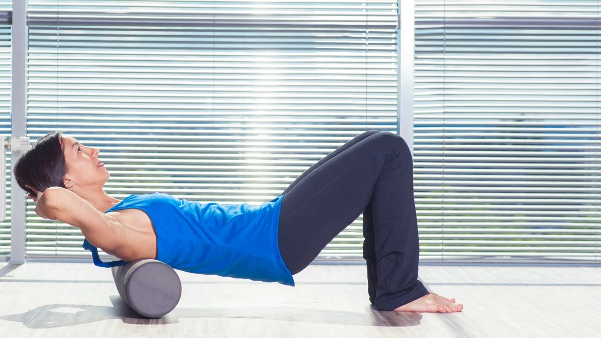 Yoga for Headaches 3 Ways to Use the Foam Roller to Release Tension