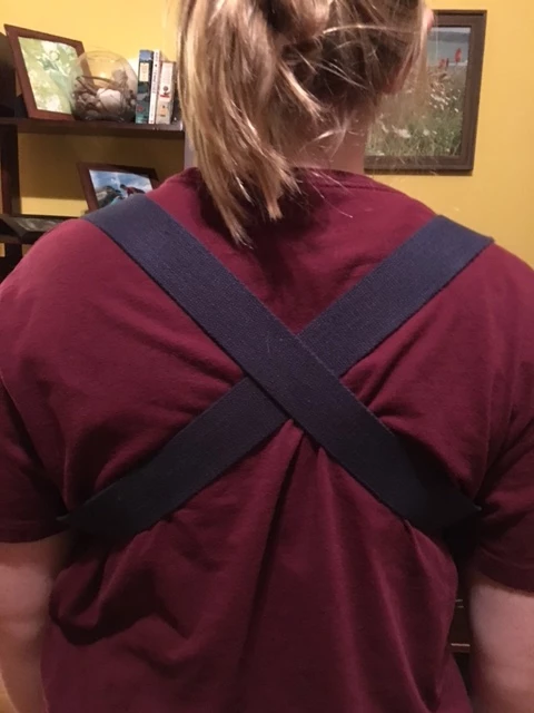 Using a yogic strap or shoulder harness to help with posture