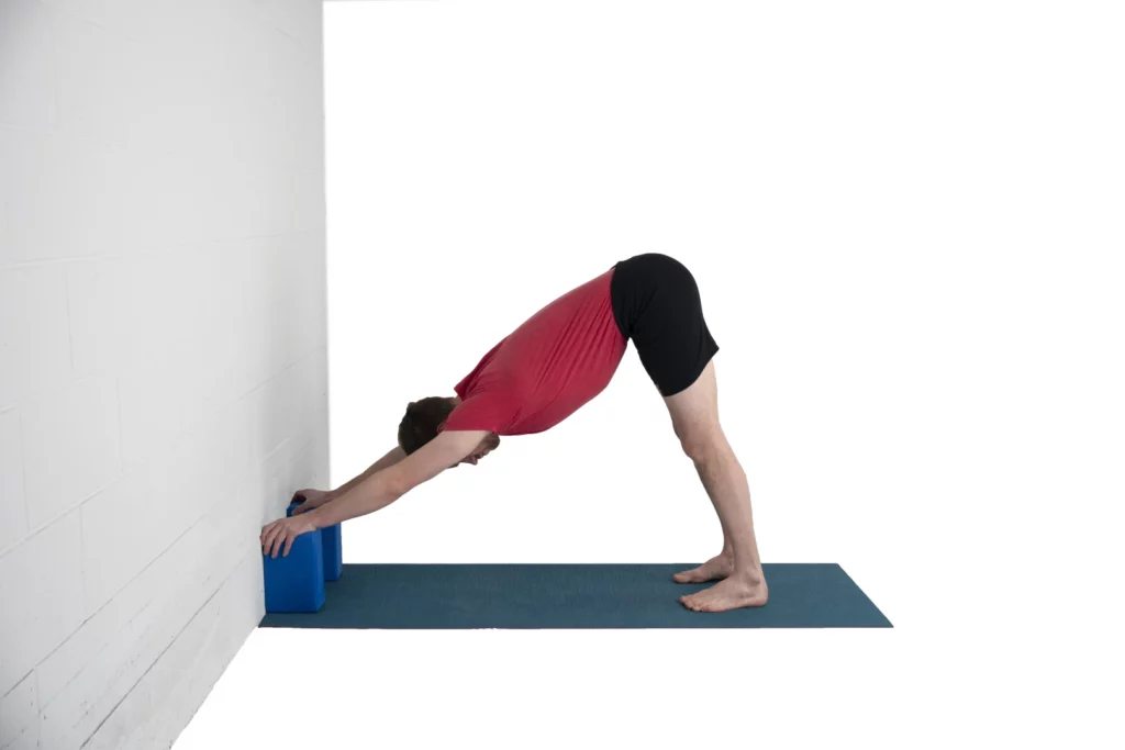 What Is Wall Yoga? The Practice Literally Takes Your Poses To New