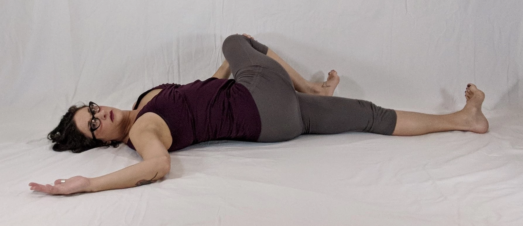 floor flow twist, supine yoga asana, gentle flow, spinal flexibilty, yoga warm up, yoga for cancer, yoga  for lymphedema