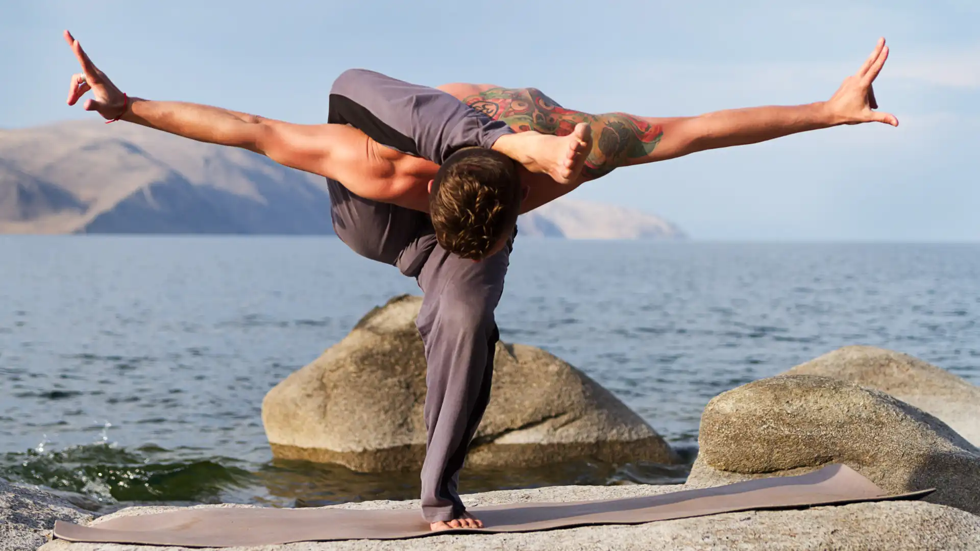 Christy Turlington shows off insane yoga pose during family beach day