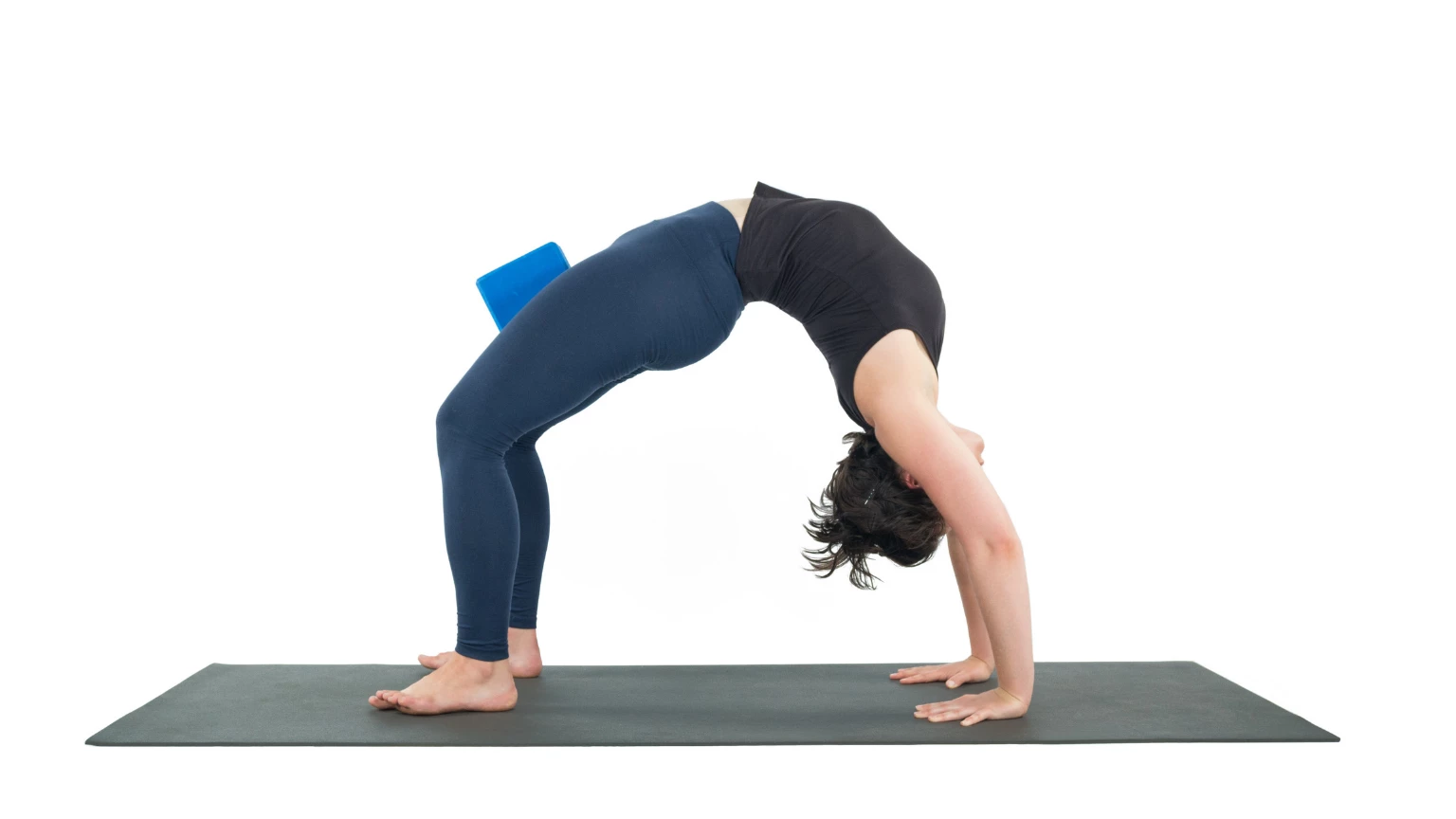 Premium Photo | Side view full body of female doing wheel pose for  strengthening body and improve flexibility while practicing yoga