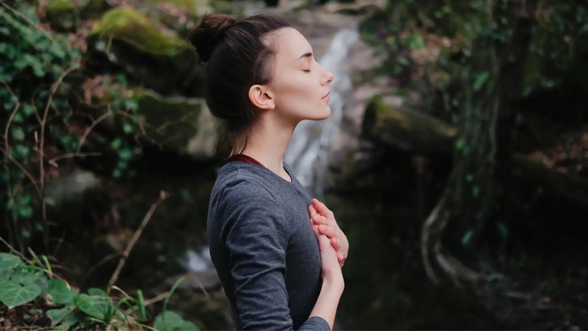 Woman practicing yoga meditation with eyes closed.