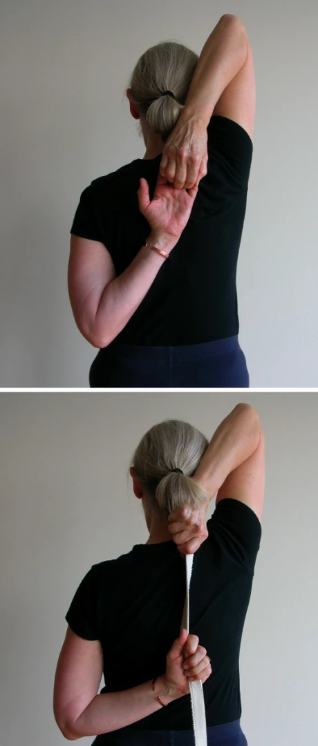 Gomukhasana, Cow-Face Pose, variations of the pose, your arms and shoulders In Gomukhasana, adding a strap to connect your hands