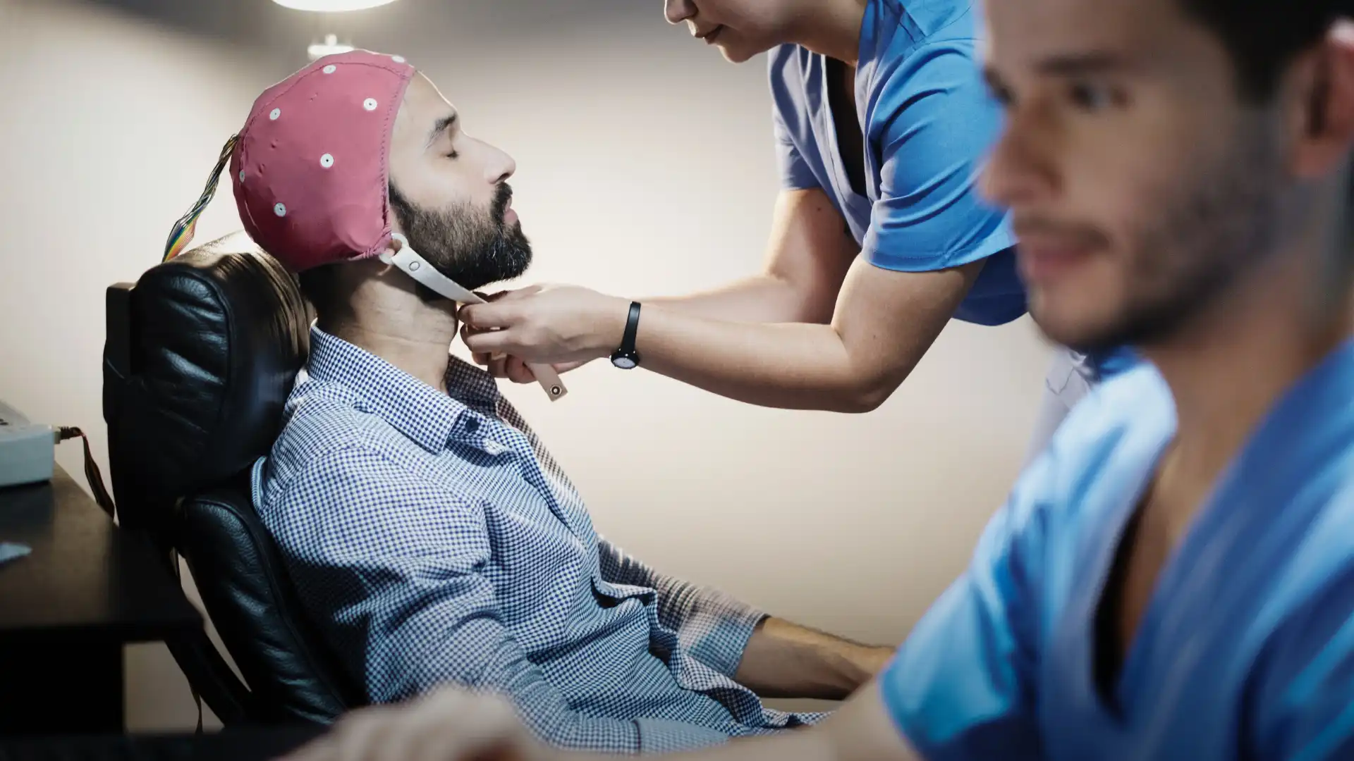 patient with alzheimer's disease being treated with bathing cap.