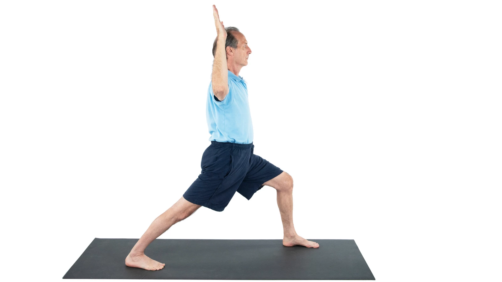 man practicing yoga warrior I with cactus arms