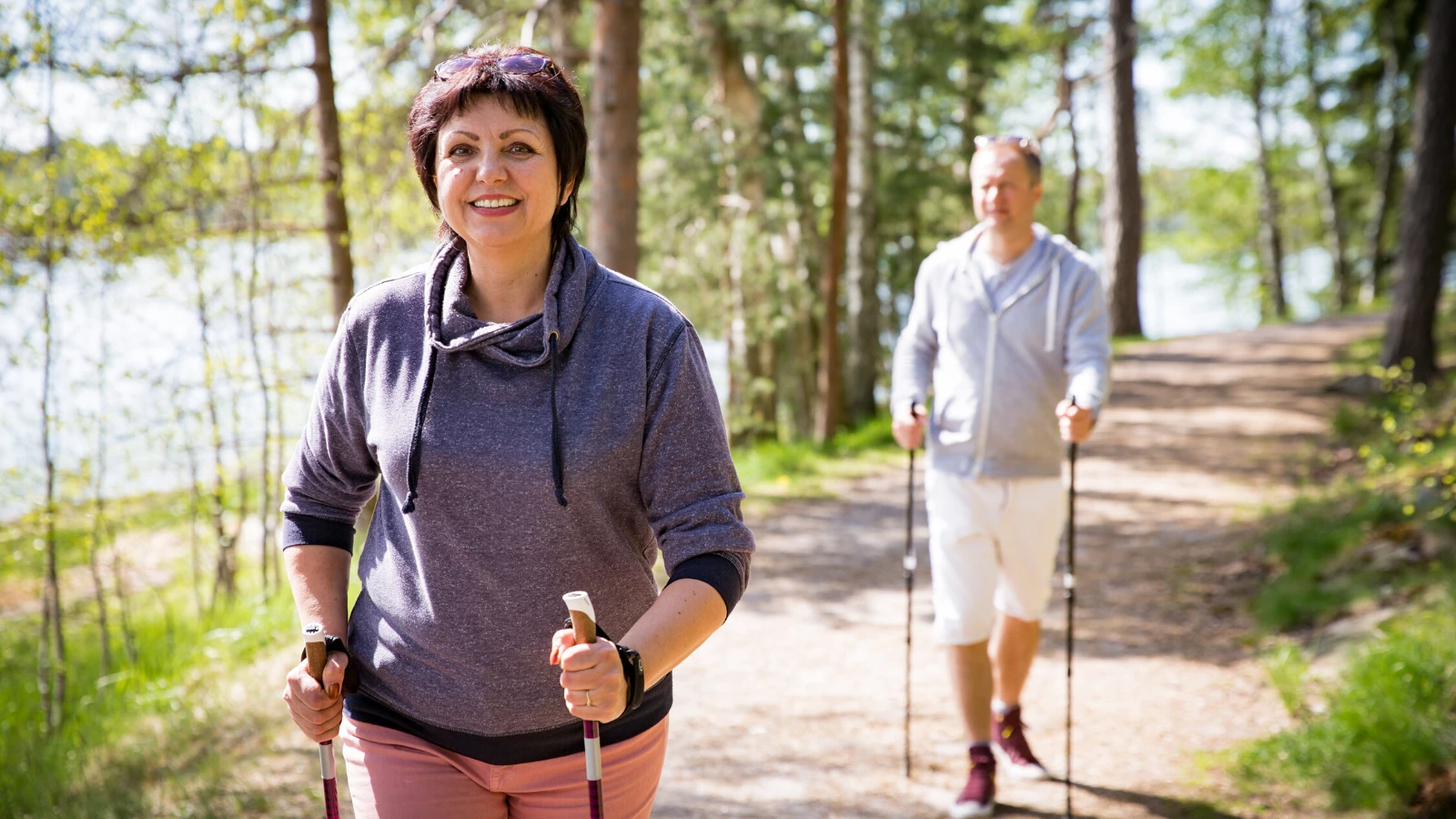 couple who practice yoga exercising in nature to boost immune system