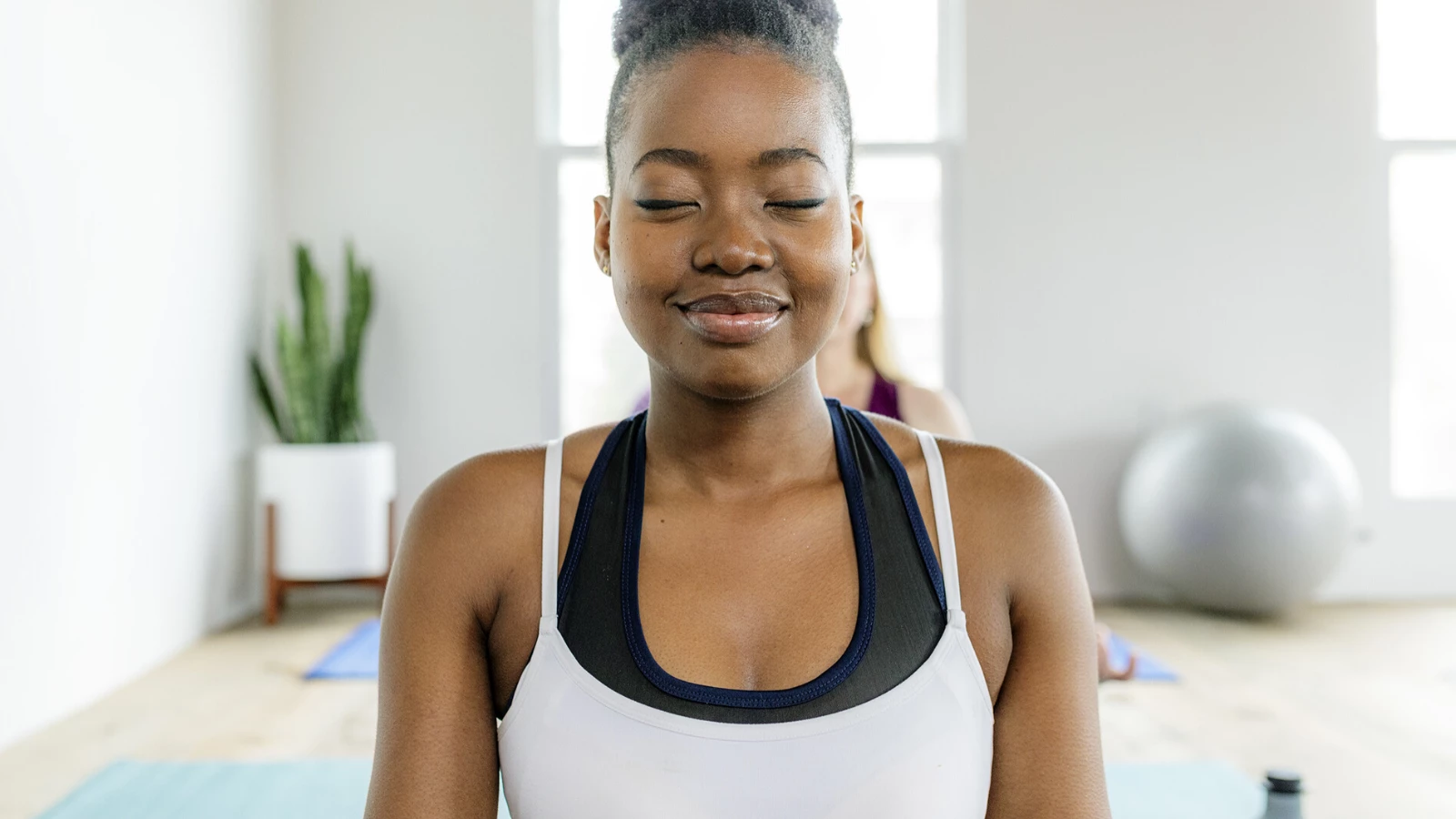 Premium Vector | Easy seated twist pose young woman practicing yoga pose