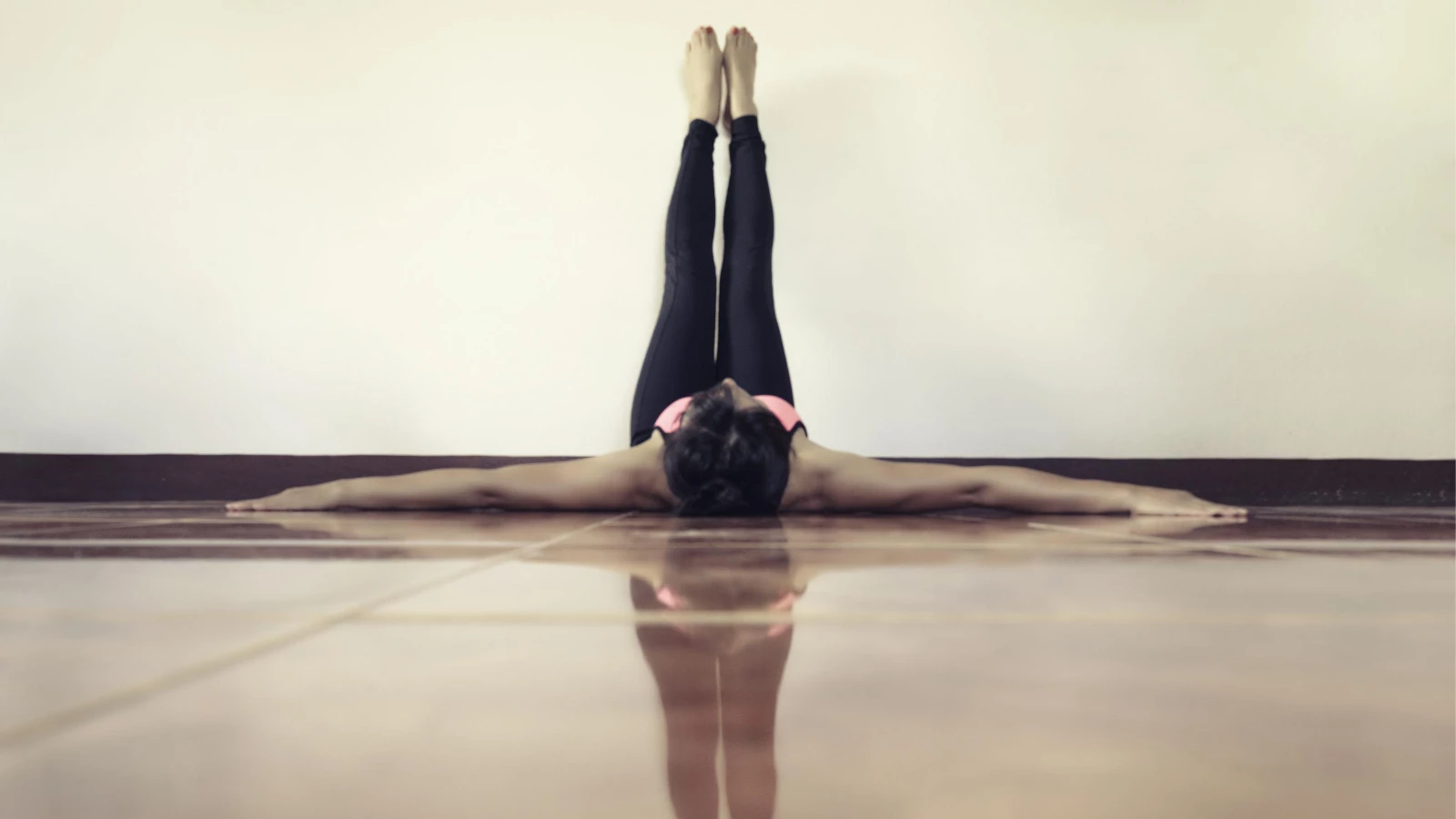 Yoga student demonstrating how to practice yoga to reduce stress and anxiety