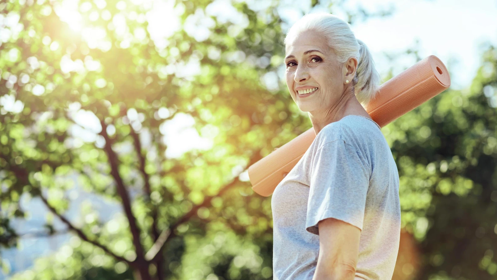 Older beginner yoga student enjoying the benefits of yoga for healthy aging