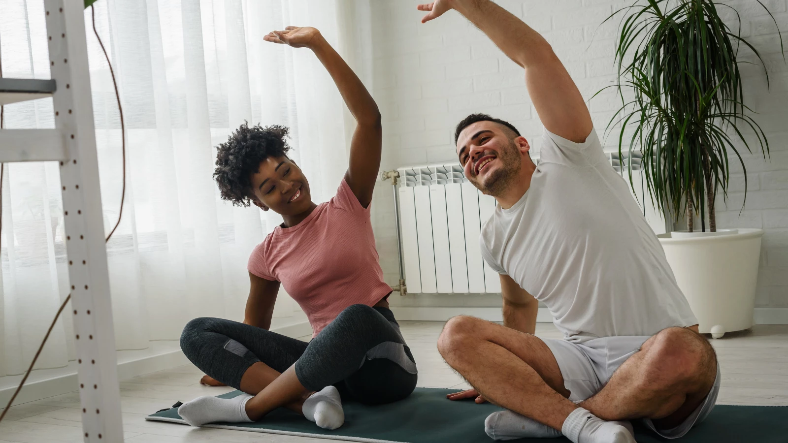 Beginning yoga students experiencing the benefits of healing and clarity of racism through yogic practice and philosophy