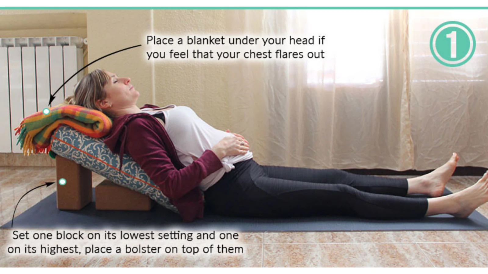 A yoga modification for pregnancy: Inclined Savasana yoga pose with straight legs on a bolster