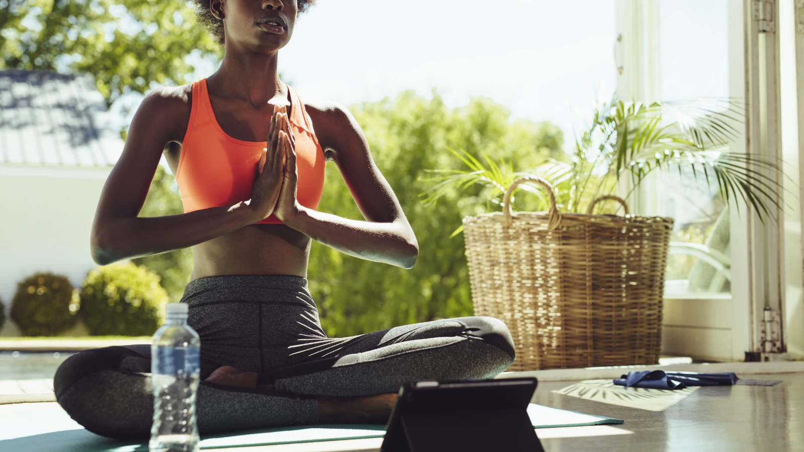 Yoga student practicing in order to decrease inflammation in the body, which is a natural immune response