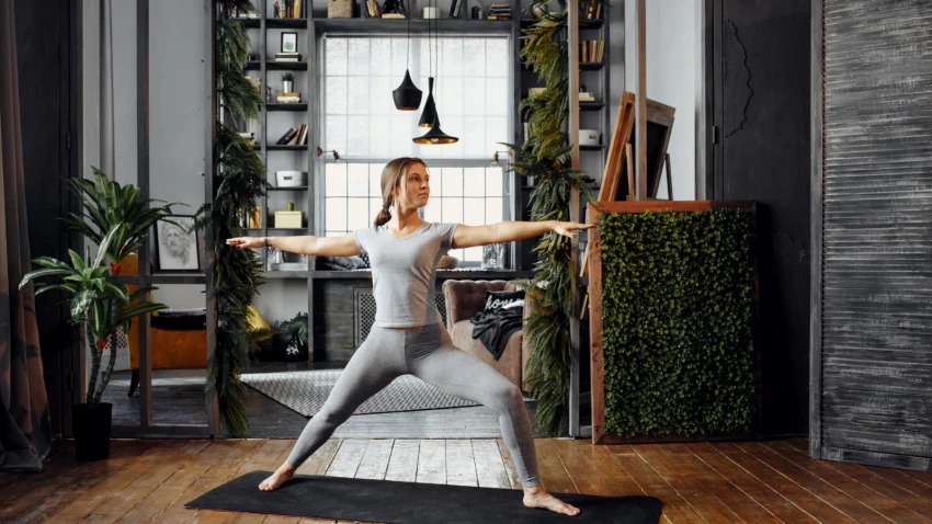 Image showing student practicing Warrior 2 a yoga standing pose