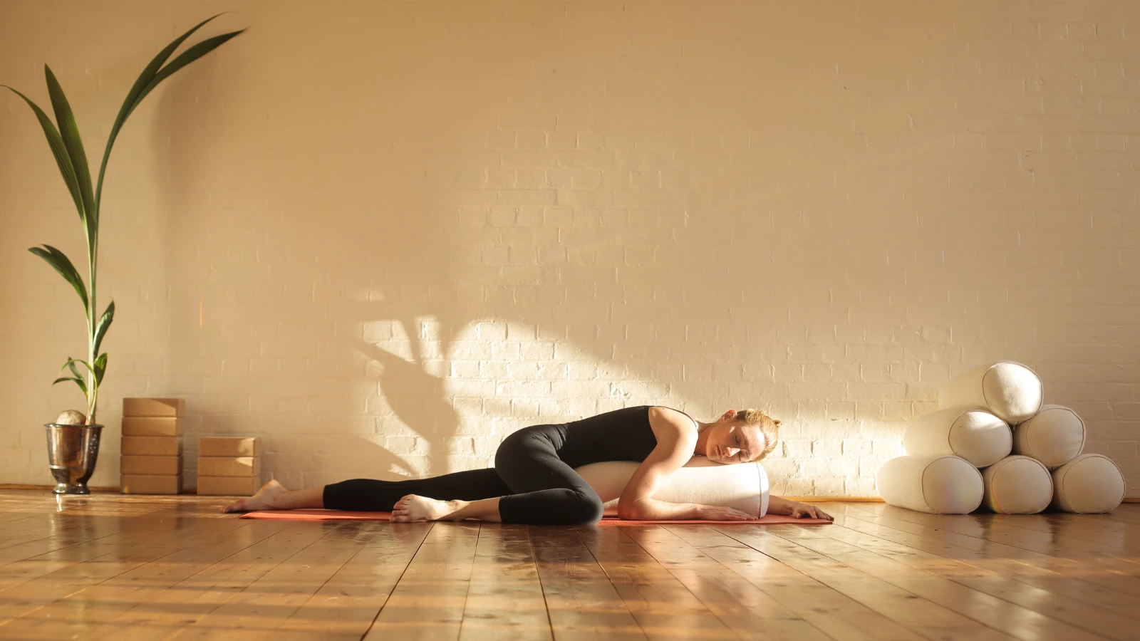 practicing restorative yoga is great way to prepare for a good night's sleep