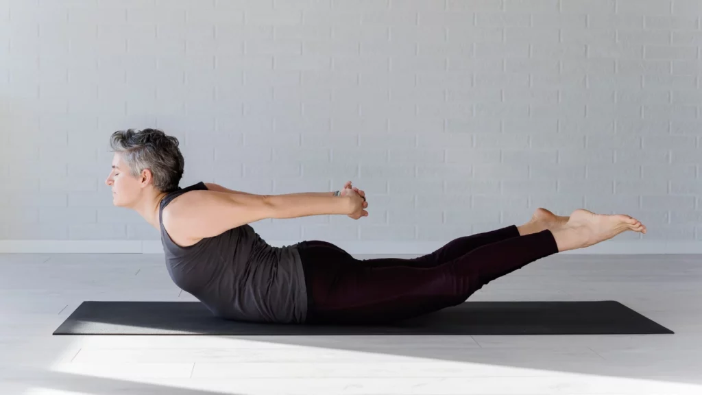 Locust Pose or Salabhasana variation for posture improvement and fluid spine.