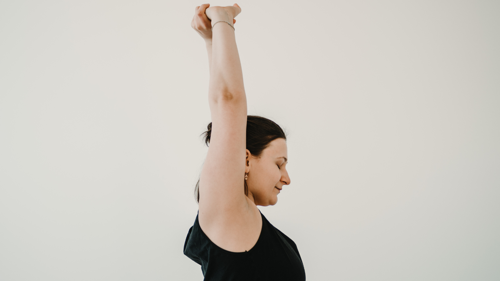 Seated Arms Overhead Pose a variation of the standing pose.