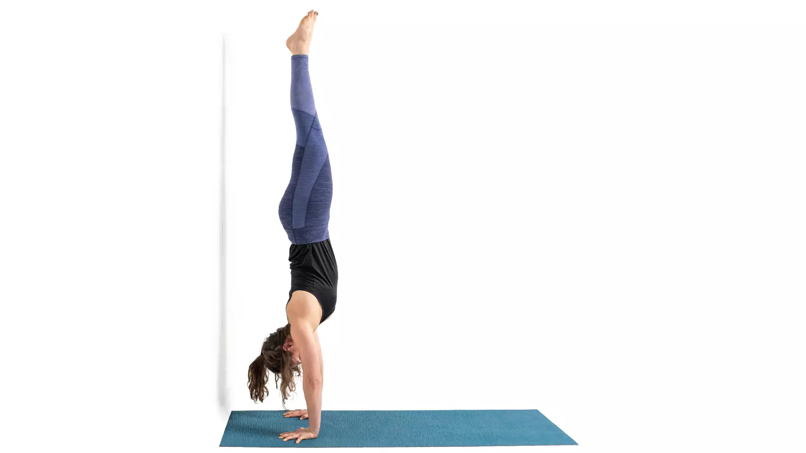 Handstand or Ado Mukha Vrksasana is a stimulating and invigorating yoga pose. 