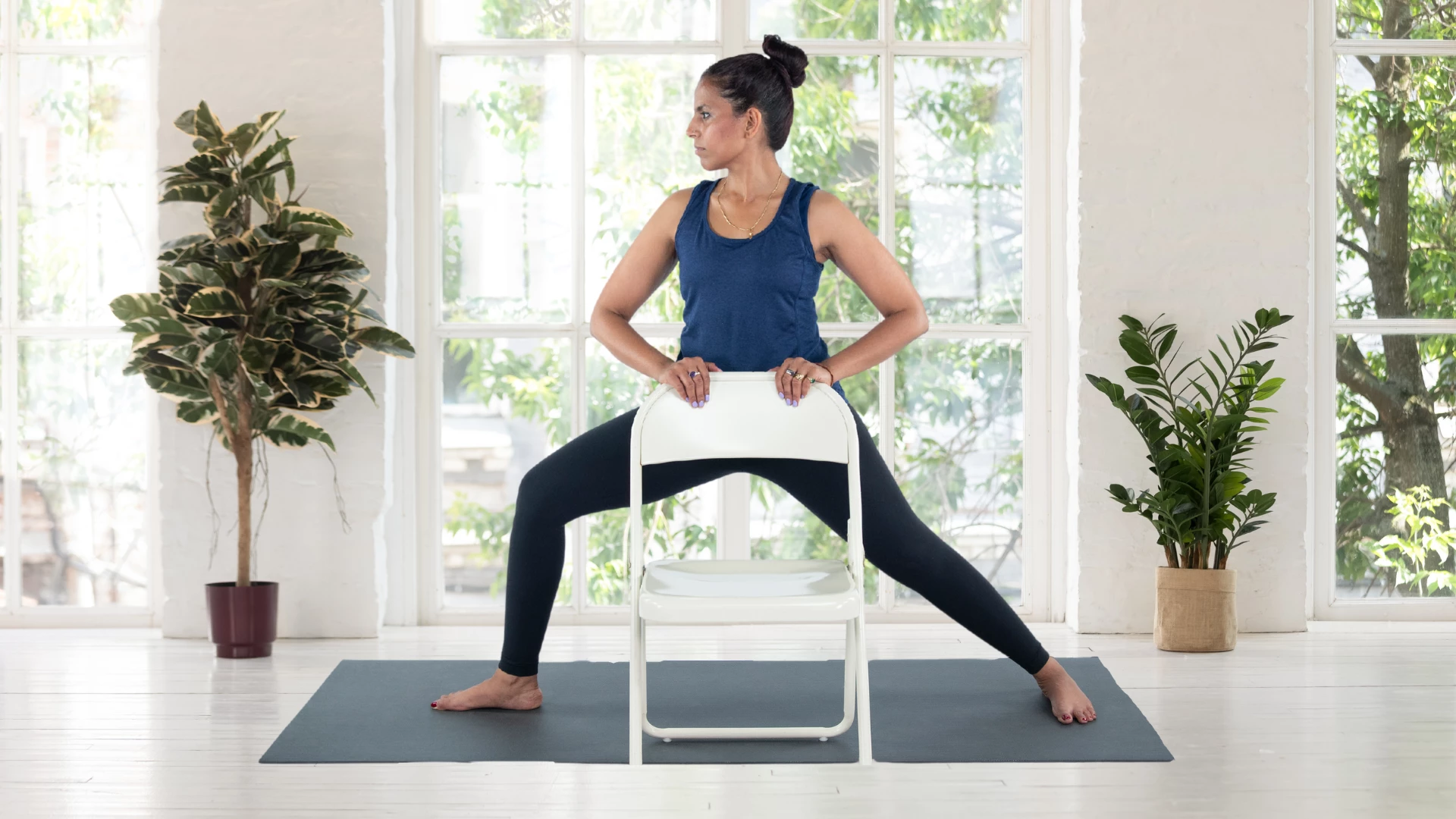 How to practice Warrior ll Pose with the support of a chair and to aid proper alignment.