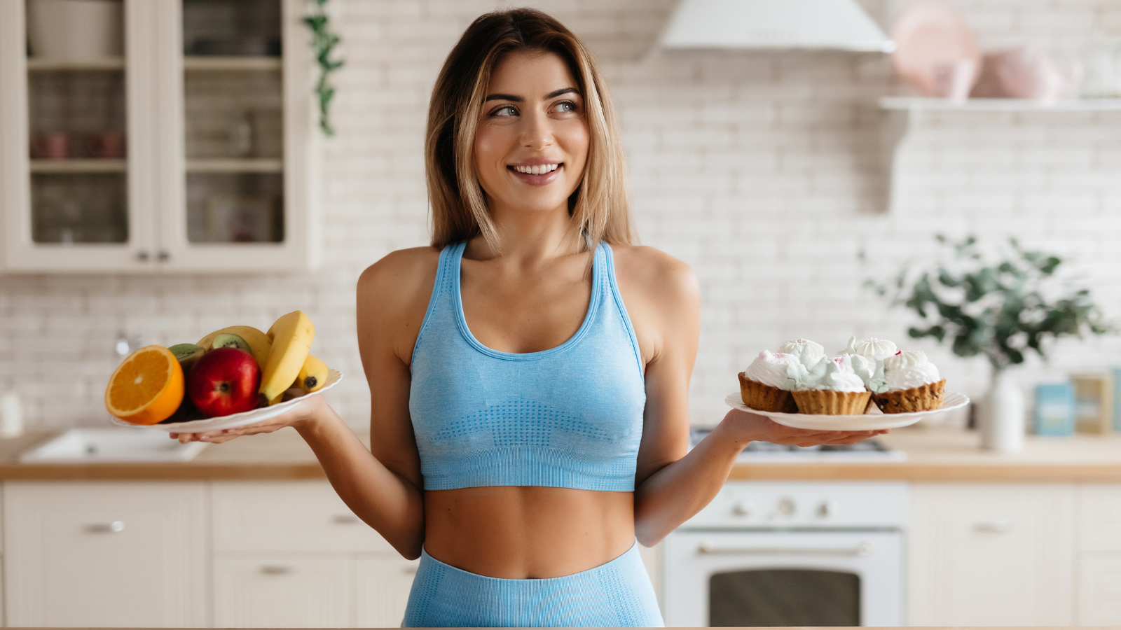 Waist-up photo of slightly hesitant young woman with two plates in hands choosing between dessert and fresh fruit and one of the benefits of fasting is cultivating better eating habits.