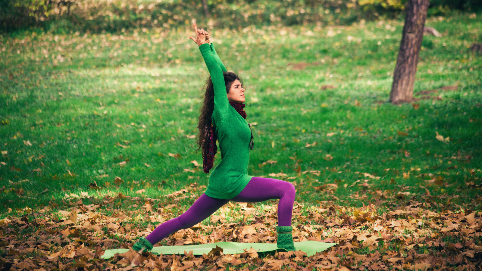 woman practice yoga outdoor in autumn when the Vata season also begins