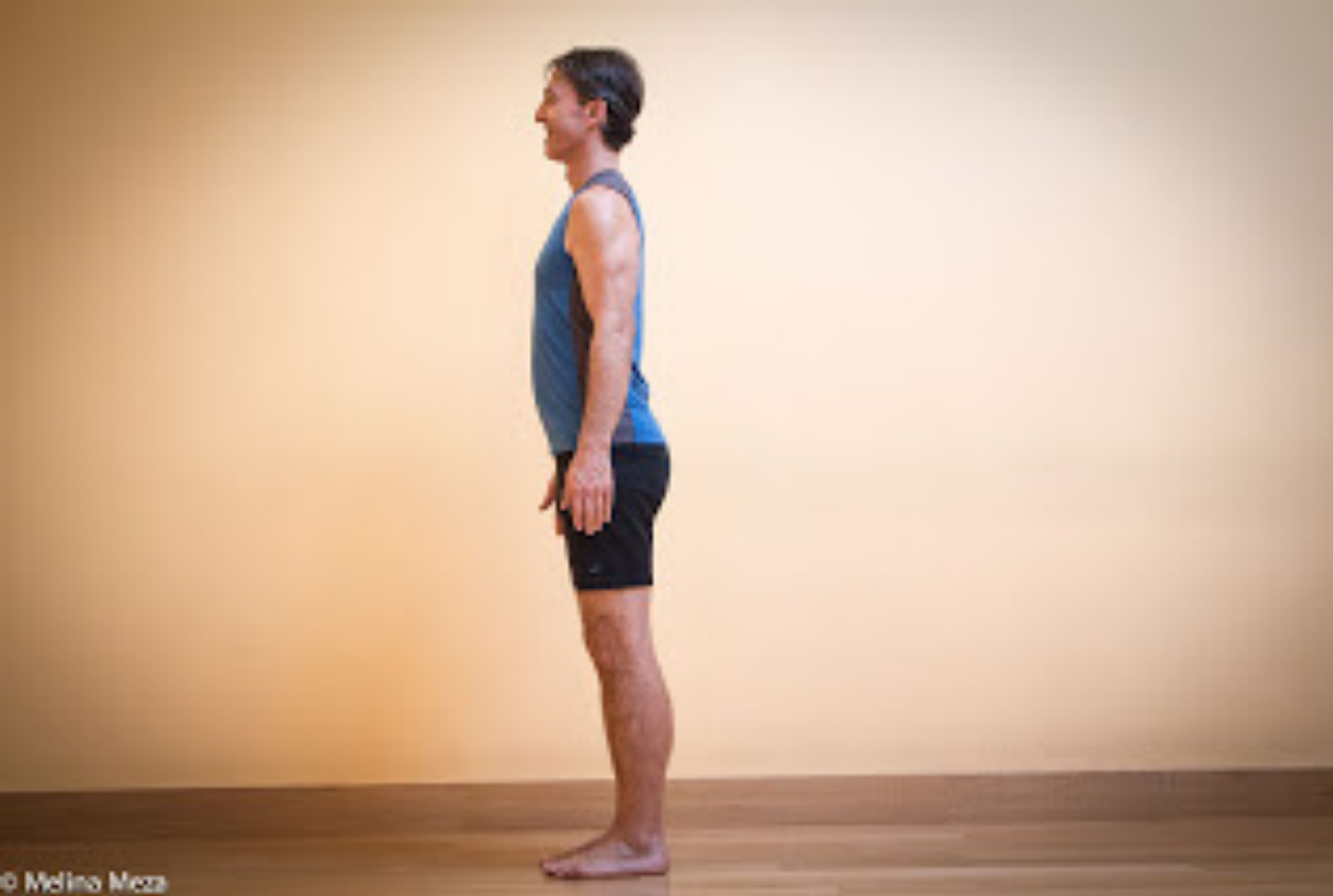 Side view of good posture and alignnment in Mountain Pose or Tadasana