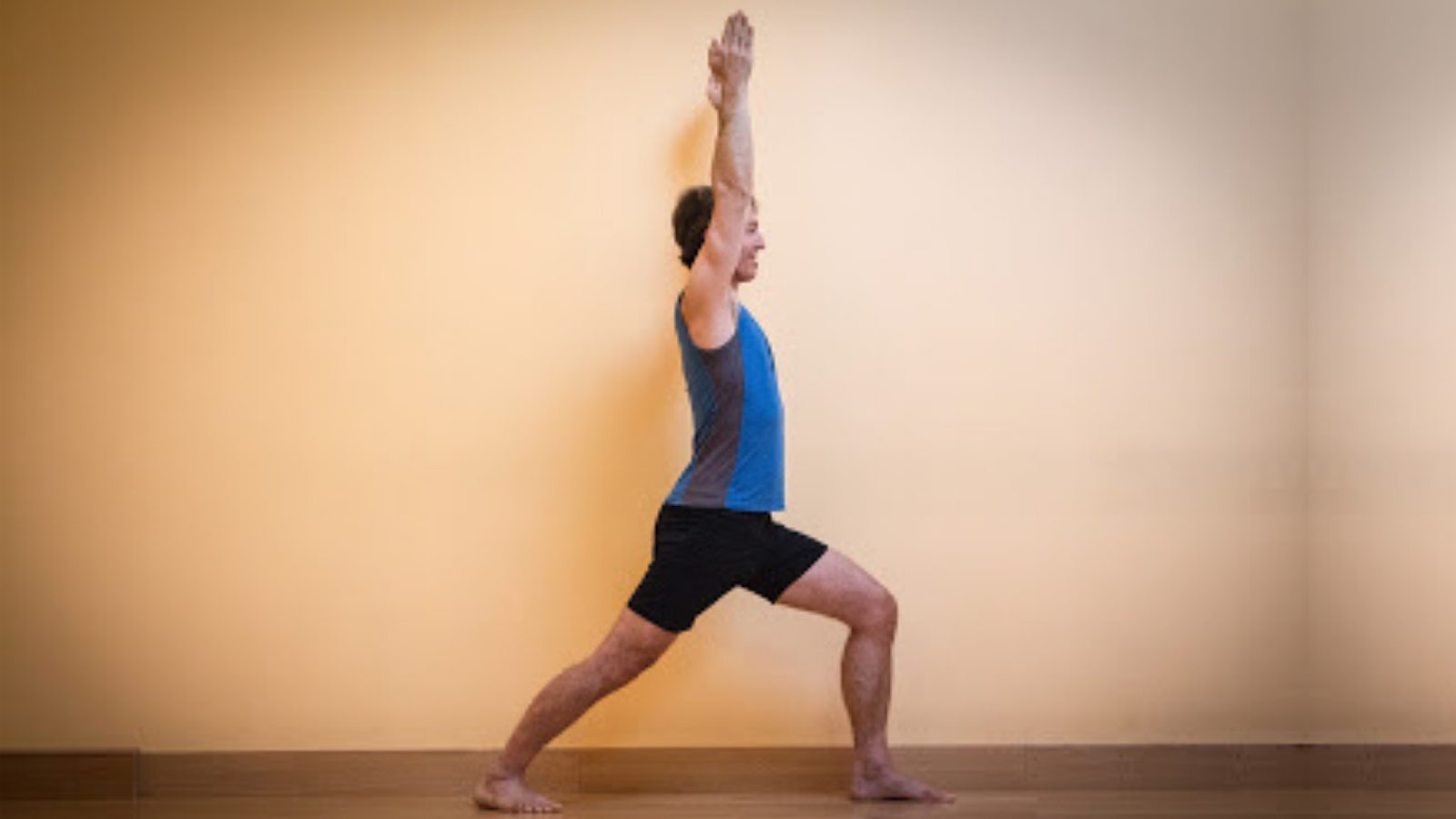  Classis Warrio1 Pose or Virabhadrasana 1 Pose with arms overhead.