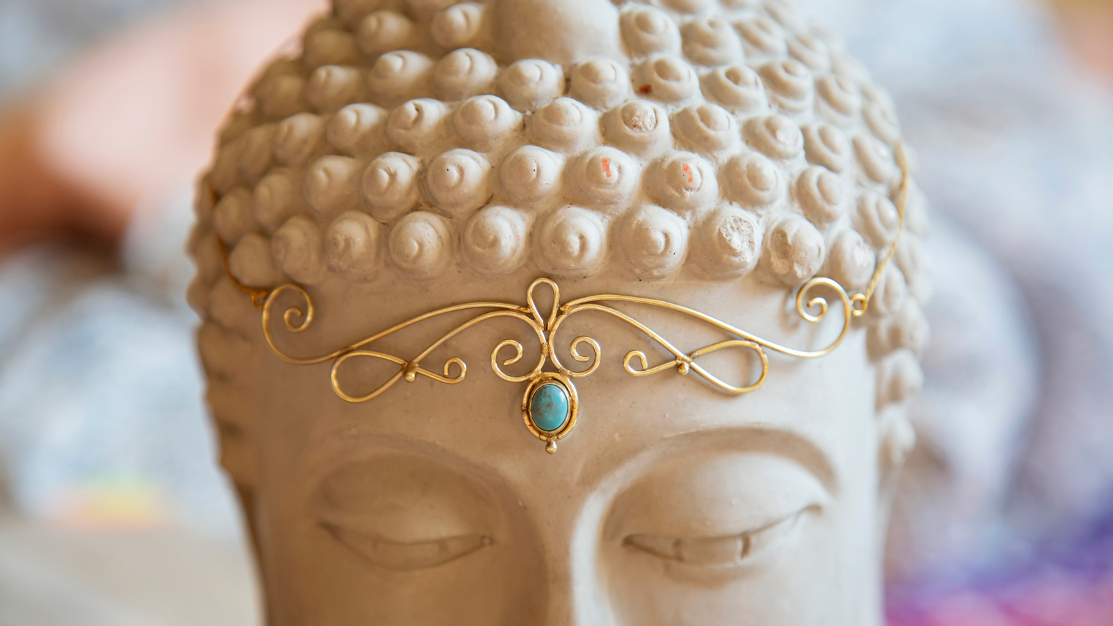  Image of Brass tiara with gemstone on Buddha statue head