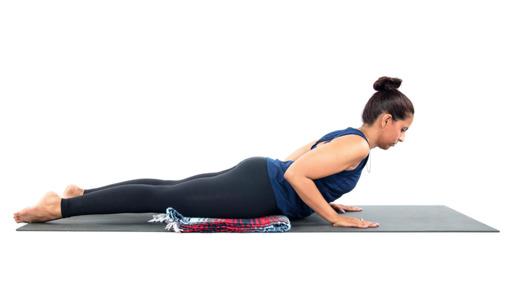 Cobra Pose is a yoga pose to reduce the negative effects of text neck or forward head syndrome.