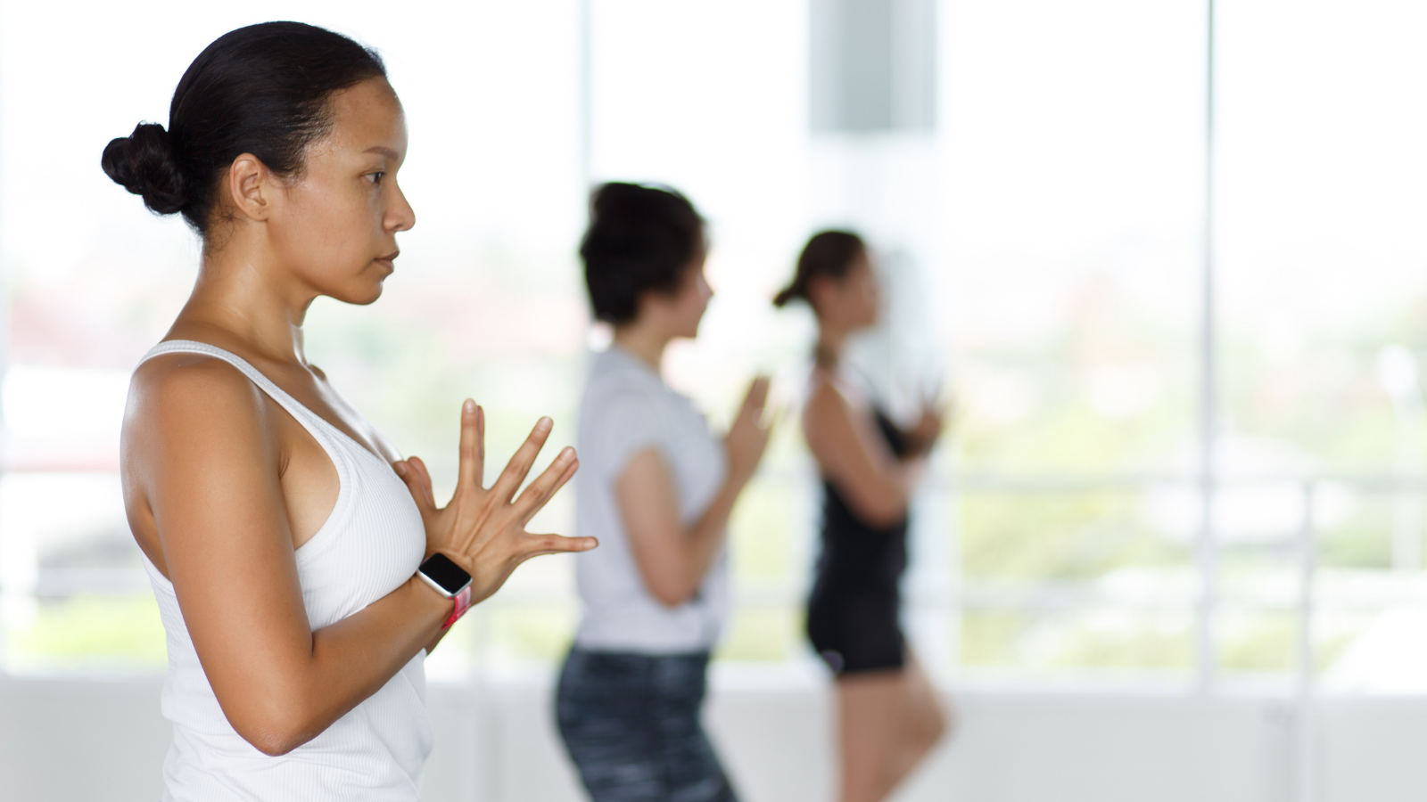 Asian Women exercising in yoga classes.