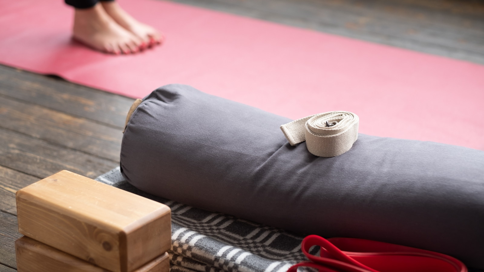 Yoga props including mat, blocks, blanket and yoga strap.