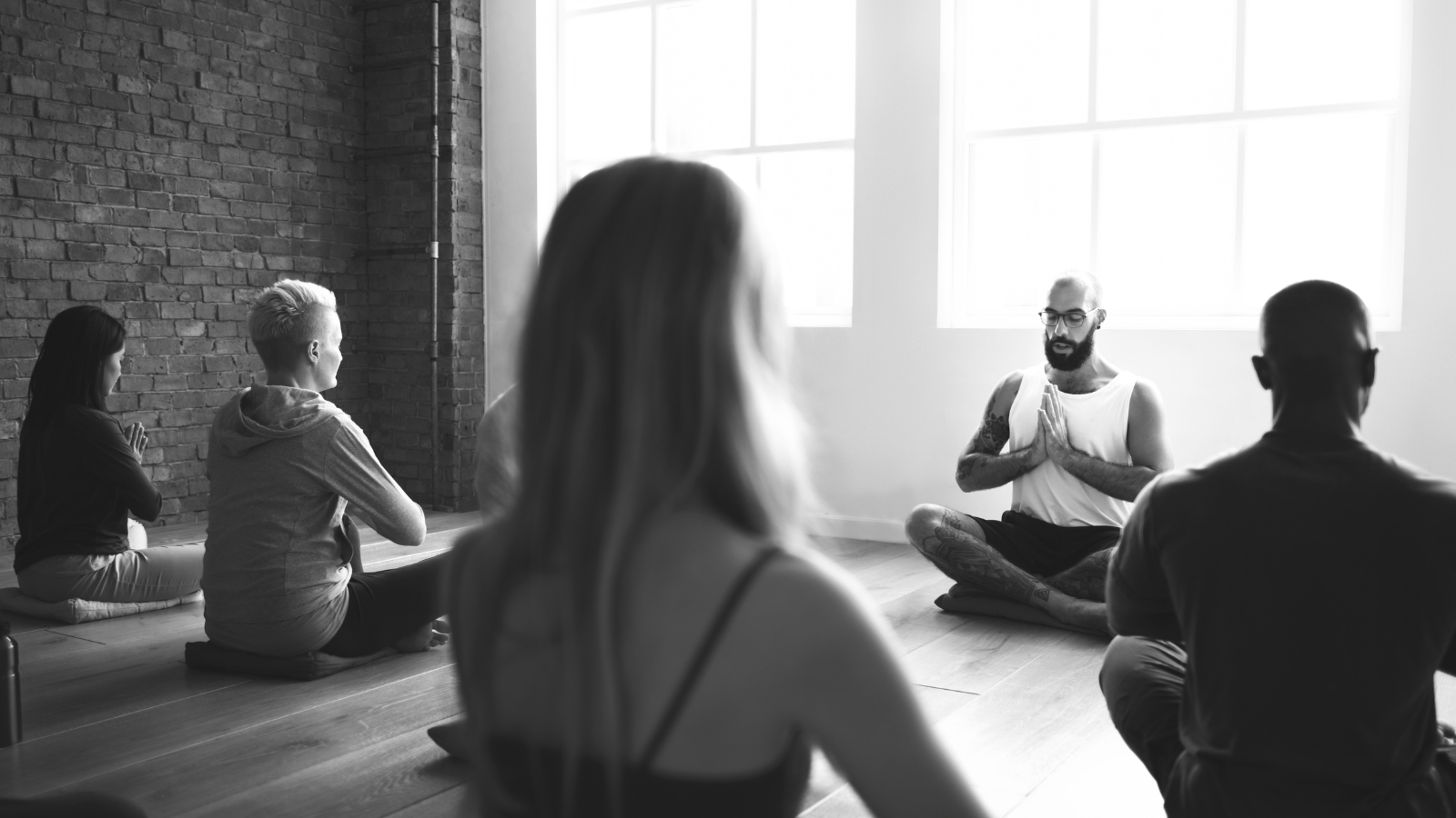 Teaching yoga practice and philosophy which involves student and teacher conversation