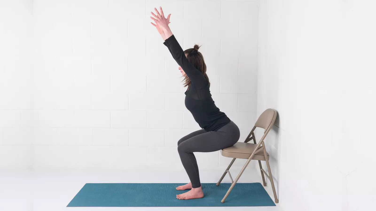 Yoga For Strength Building Add Oomph To Chair Pose With These Wall 