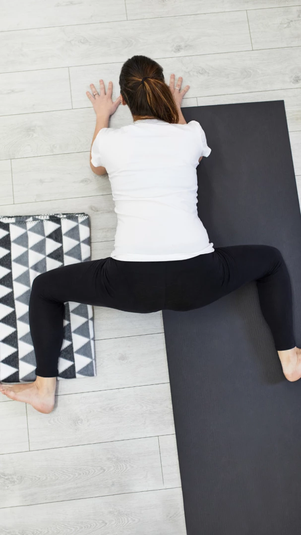 Fitness, Stretching Practice, Group Of Two Attractive Happy Smiling Fit  Mature Women Working Out In Sports Club, Doing Frog Yin Yoga Pose, Mandukasana  Posture In Class, Full Length Stock Photo, Picture and