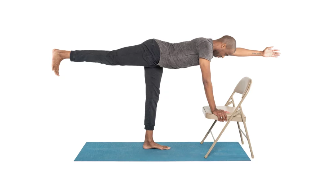 Yoga balance tips for Warrior lll variation using a chair.